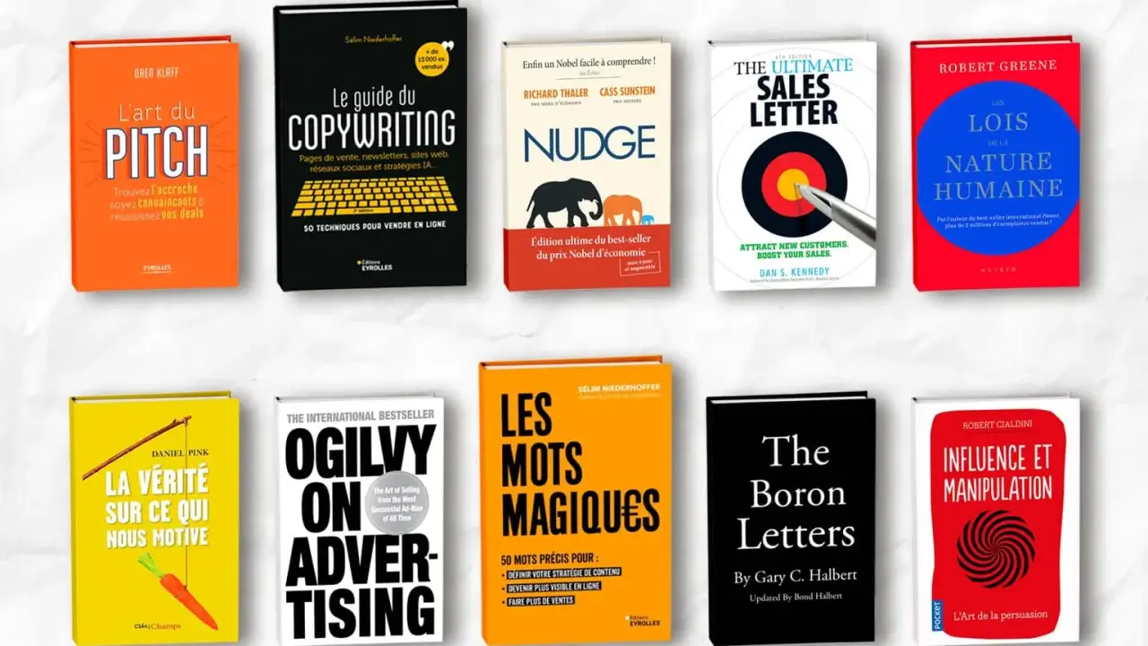 Une pile de livres sur le marketing et la persuasion, une excellente idée de livre à écrire pour les entrepreneurs.