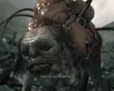 Un monstre difforme, digne d'un méchant film d'horreur, pose une question troublante : "Mais de quoi tu parles ?