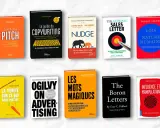 Une pile de livres sur le marketing et la persuasion, une excellente idée de livre à écrire pour les entrepreneurs.