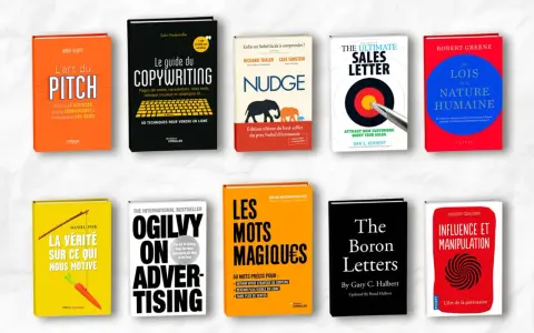 Une pile de livres sur le marketing et la persuasion, une excellente idée de livre à écrire pour les entrepreneurs.