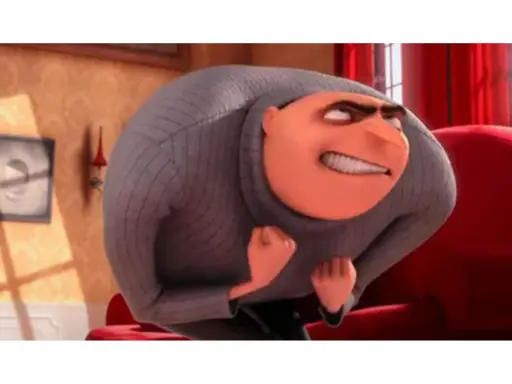 Gru, un anti-héros exemple, se penche en avant avec un sourire malicieux, poings serrés, prêt à conquérir le monde.