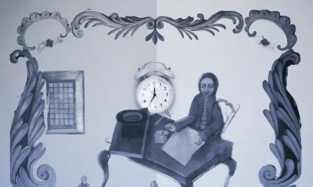 Une scène stylisée montre une personne assise à un bureau, stylo à la main, comme un exercice pour apprendre à écrire. Une horloge indique l'heure.