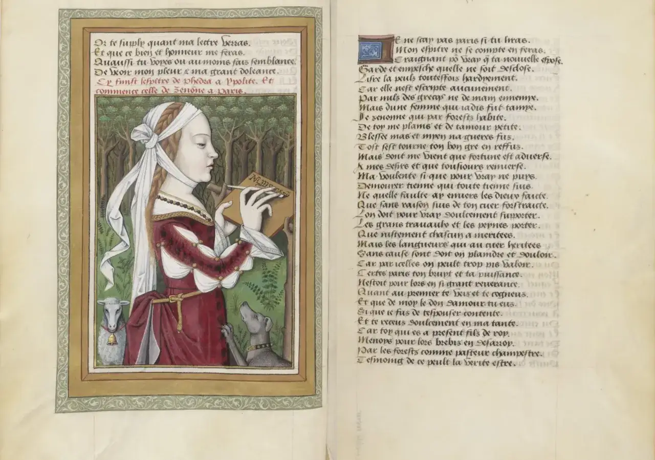 Une jeune femme, auteur humaniste, &eacute;crit dans un livre, accompagn&eacute;e d'un chien et d'un mouton.